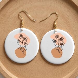 Elegant Floral Earrings in White and Orange